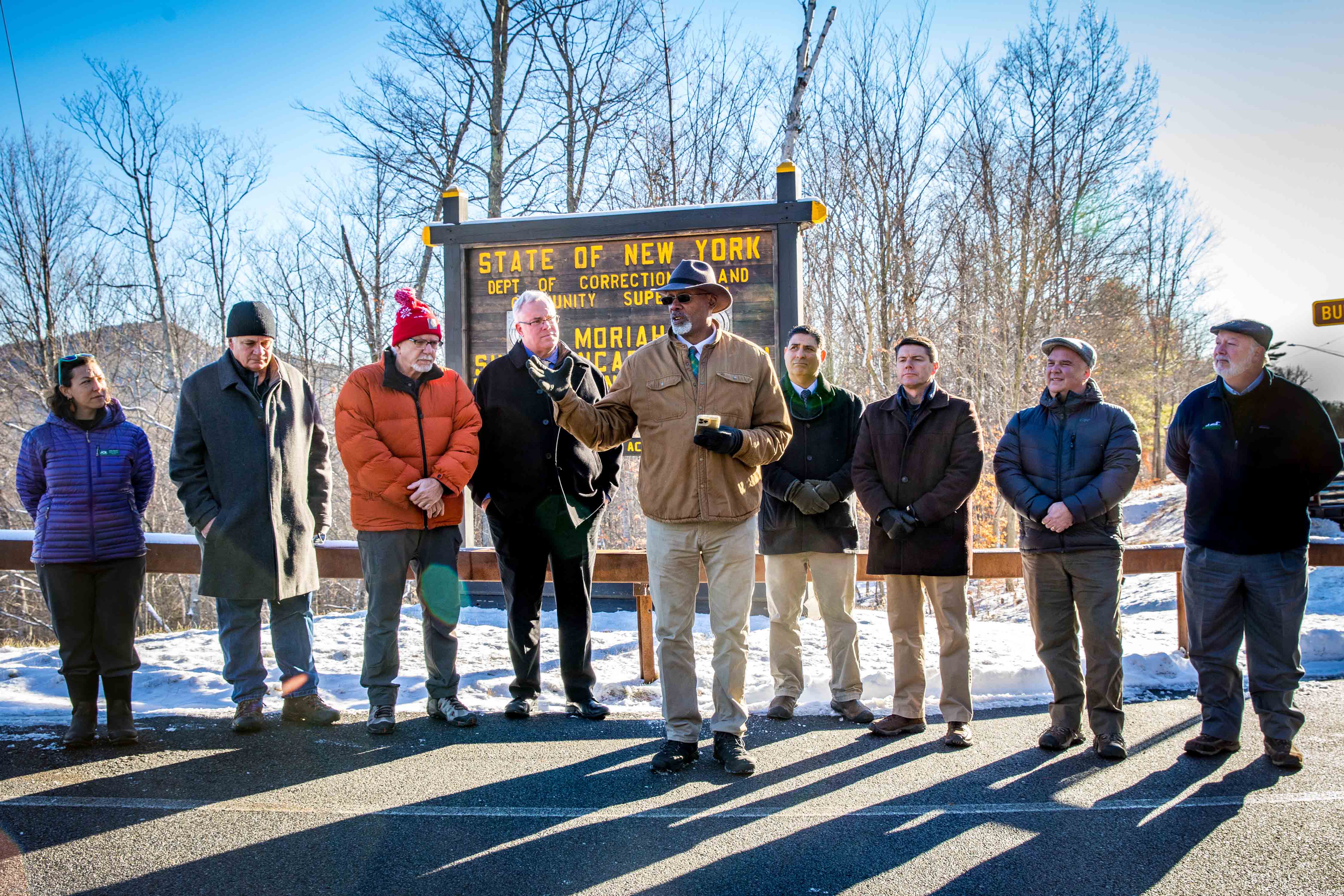 Elected officials and environmental leaders speak at Moriah Shock Corrections Facility